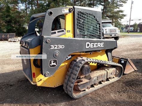 john deere 323 d skid steer track adjustment|jd 323d skid steer specs.